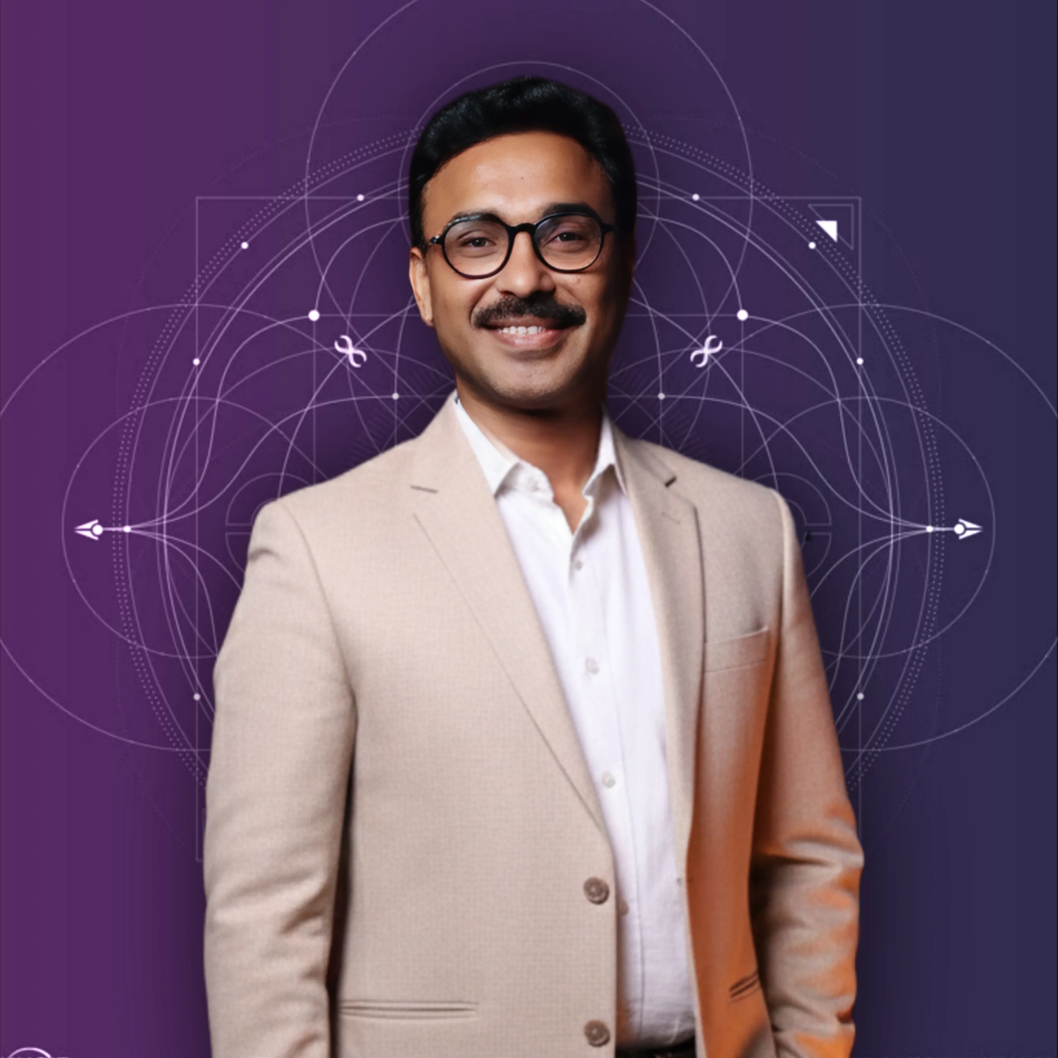 Adarshh Panndey in a studio portrait against a purple background