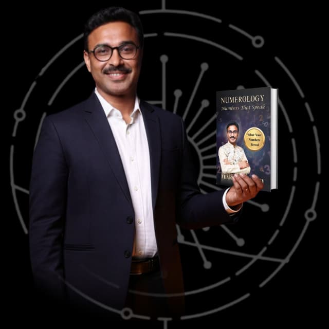 Adarshh Panndey holding his book Numerology: Numbers That Speak